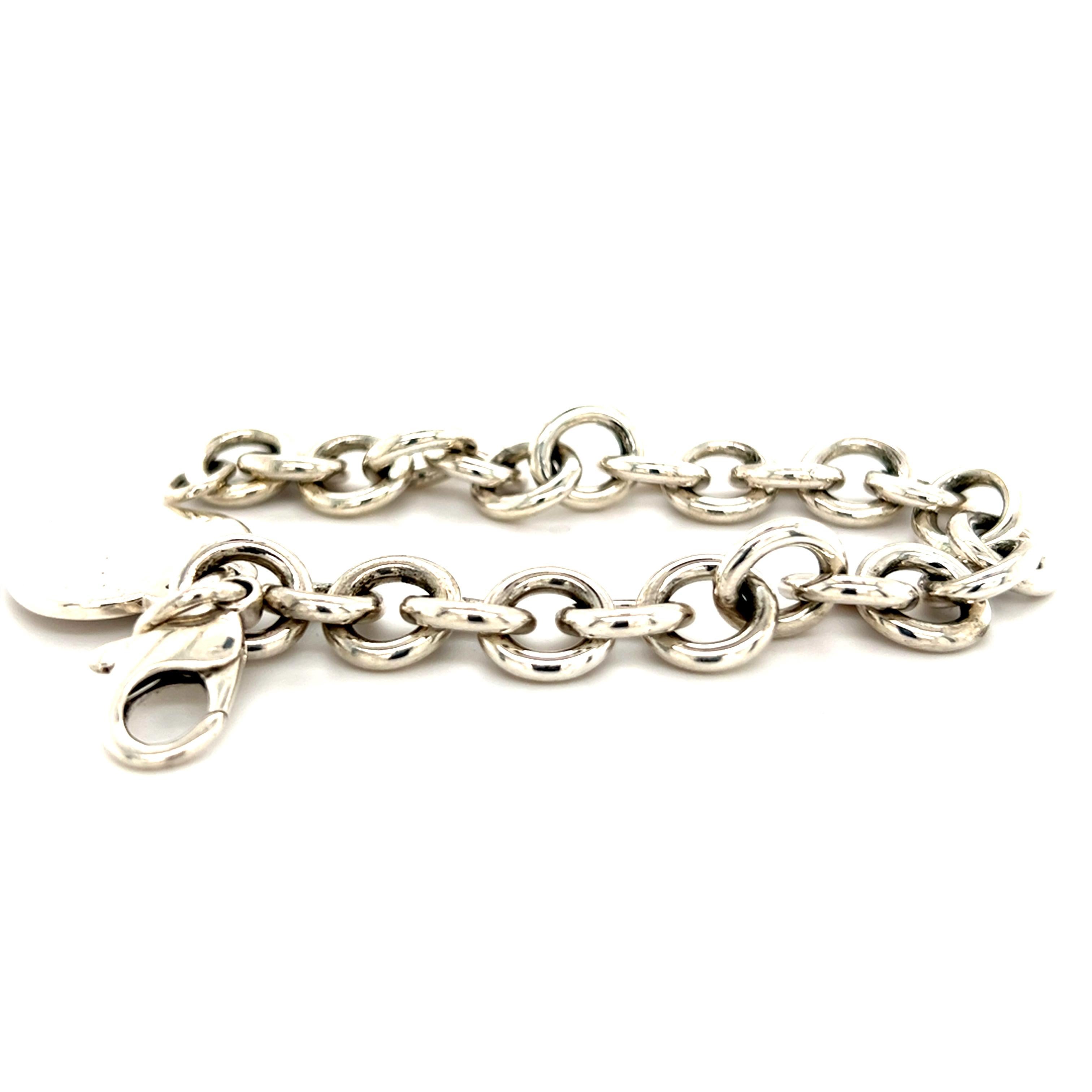 Tiffany & Co. Bracelet à breloques en forme de cœur en argent sterling, 35,5 grammes en vente 6