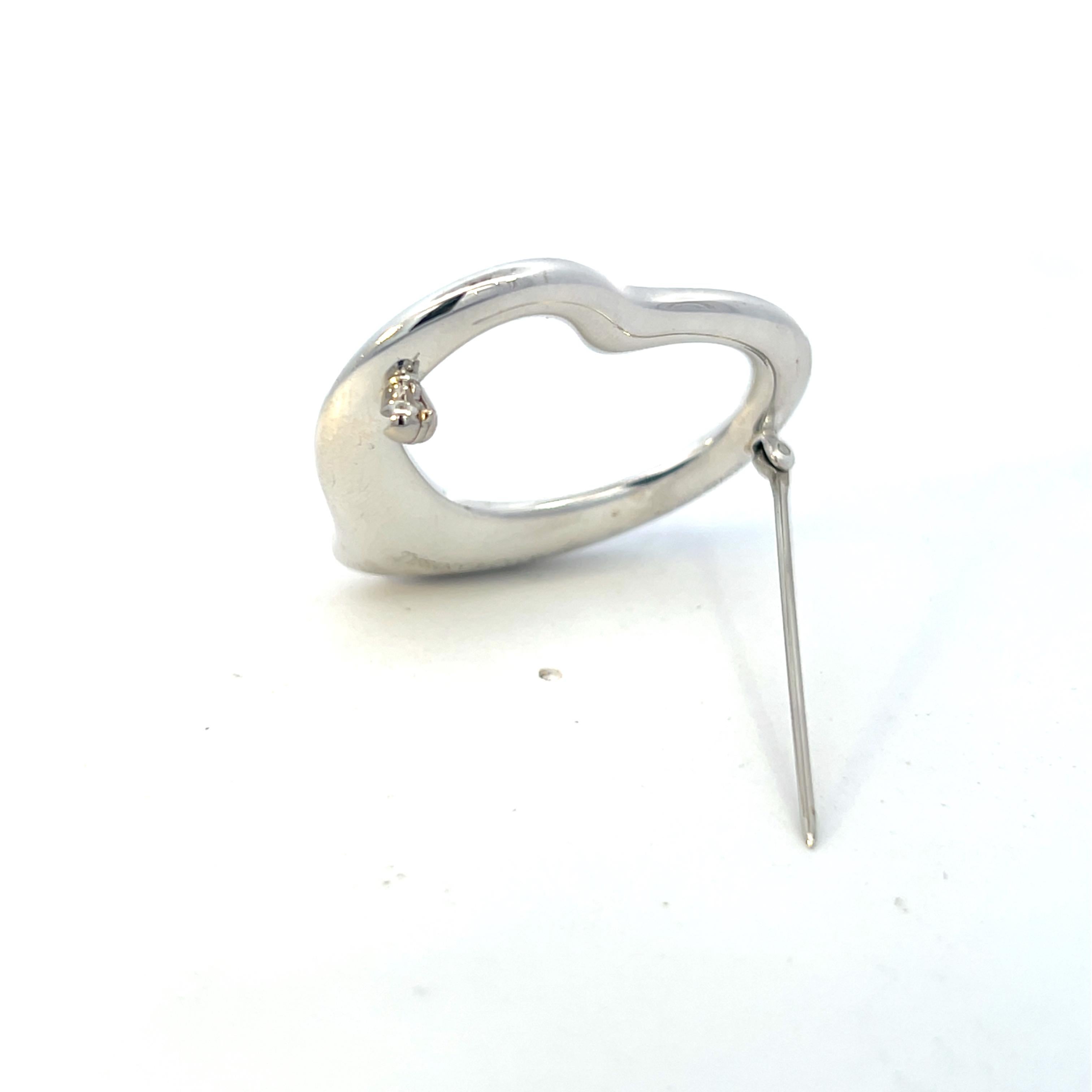 Tiffany & Co Estate Large Open Heart Brooch By Elsa Peretti Silver TIF745

TRUSTED SELLER SINCE 2002

PLEASE SEE OUR HUNDREDS OF POSITIVE FEEDBACKS FROM OUR CLIENTS!!

FREE SHIPPING!!

DETAILS
Style: Large Open Heart Brooch
Metal: Sterling