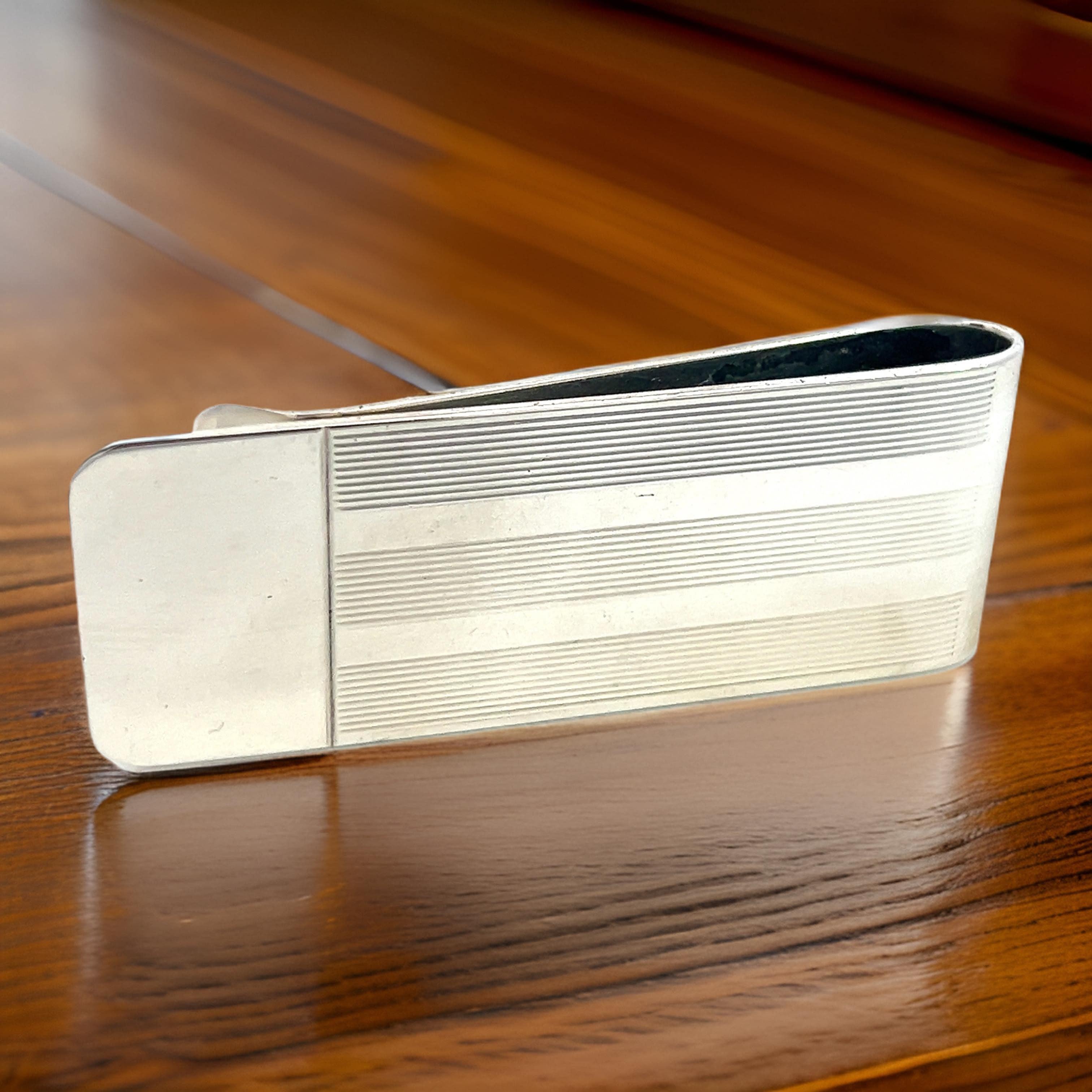 Tiffany & Co Estate Etched Money Clip Sterling Silver TIF712

Newly polished and looks wonderful. 
Ready for Engraving!

TRUSTED SELLER SINCE 2002

PLEASE SEE OUR HUNDREDS OF POSITIVE FEEDBACKS FROM OUR CLIENTS!!

FREE SHIPPING

This elegant