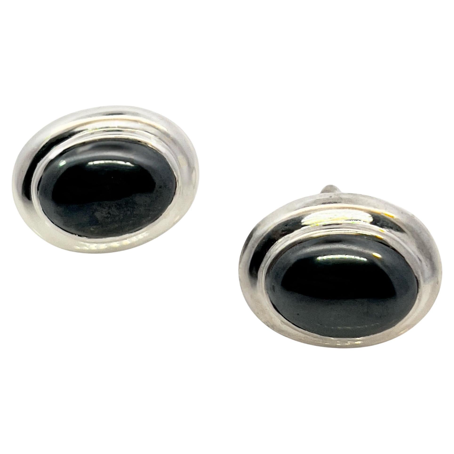 Authentic Tiffany & Co Estate Natural Hematite Cabochon Earrings Sterling Silver TIF786

These Authentic Tiffany & Co. estate earrings feature iconic natural hematite cabochons beautifully set in sterling silver.


Newly polished to restore their
