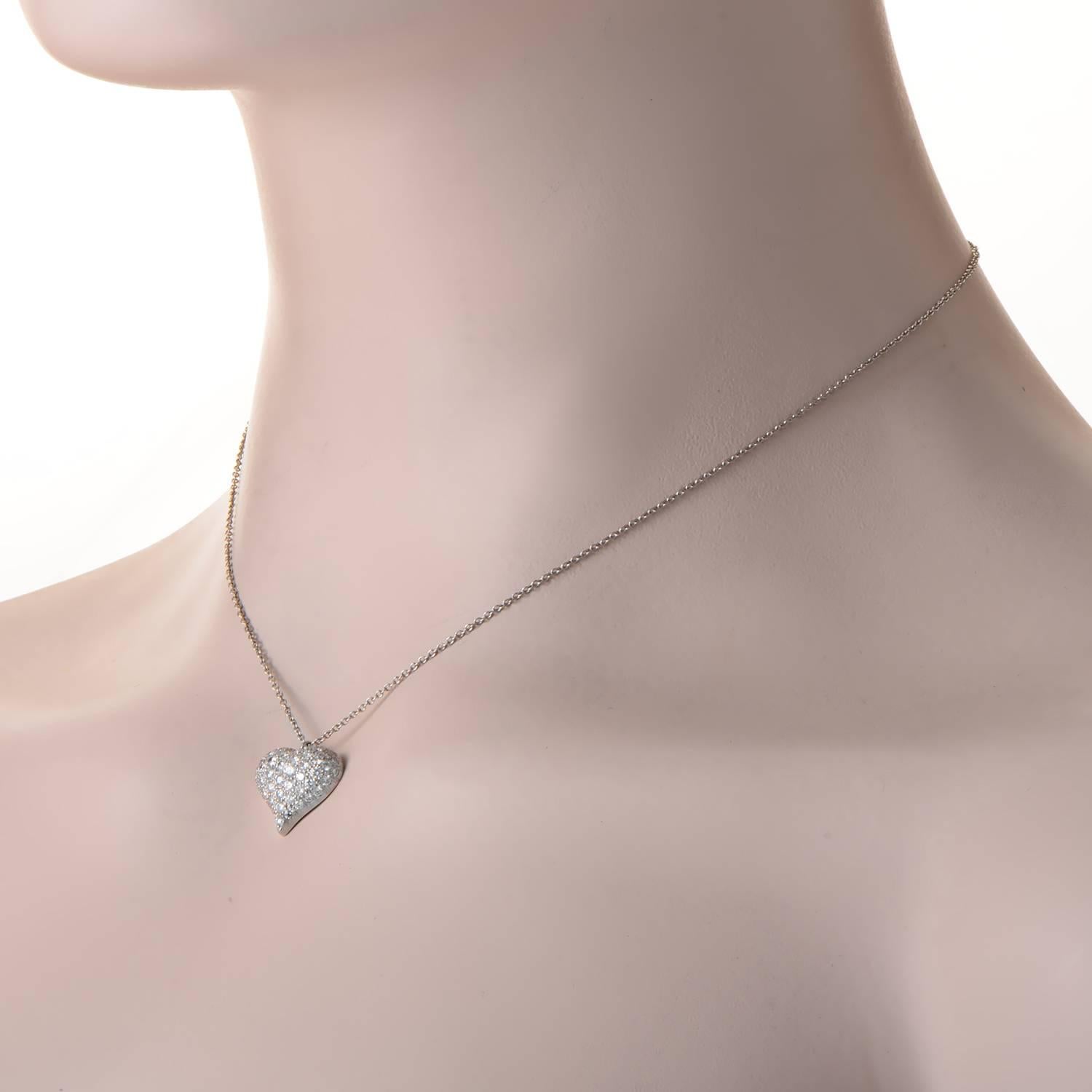 Classy and elegant, with lovely romantic design, this enchanting necklace from Tiffany & Co. offers tasteful luxurious appearance. The necklace is made of prestigious platinum and weighs six grams, while the diamonds paving the heart pendant total