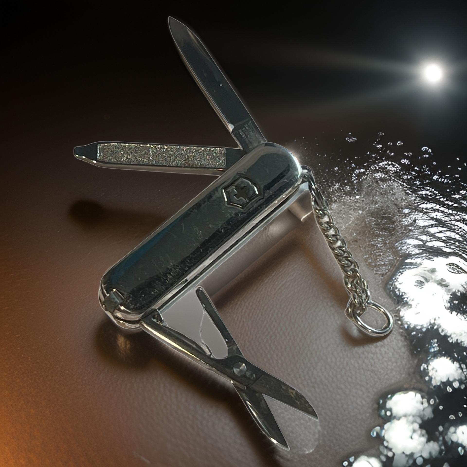 Couteau de poche Tiffany & Co avec chaîne à clé en argent 18 carats en vente 1