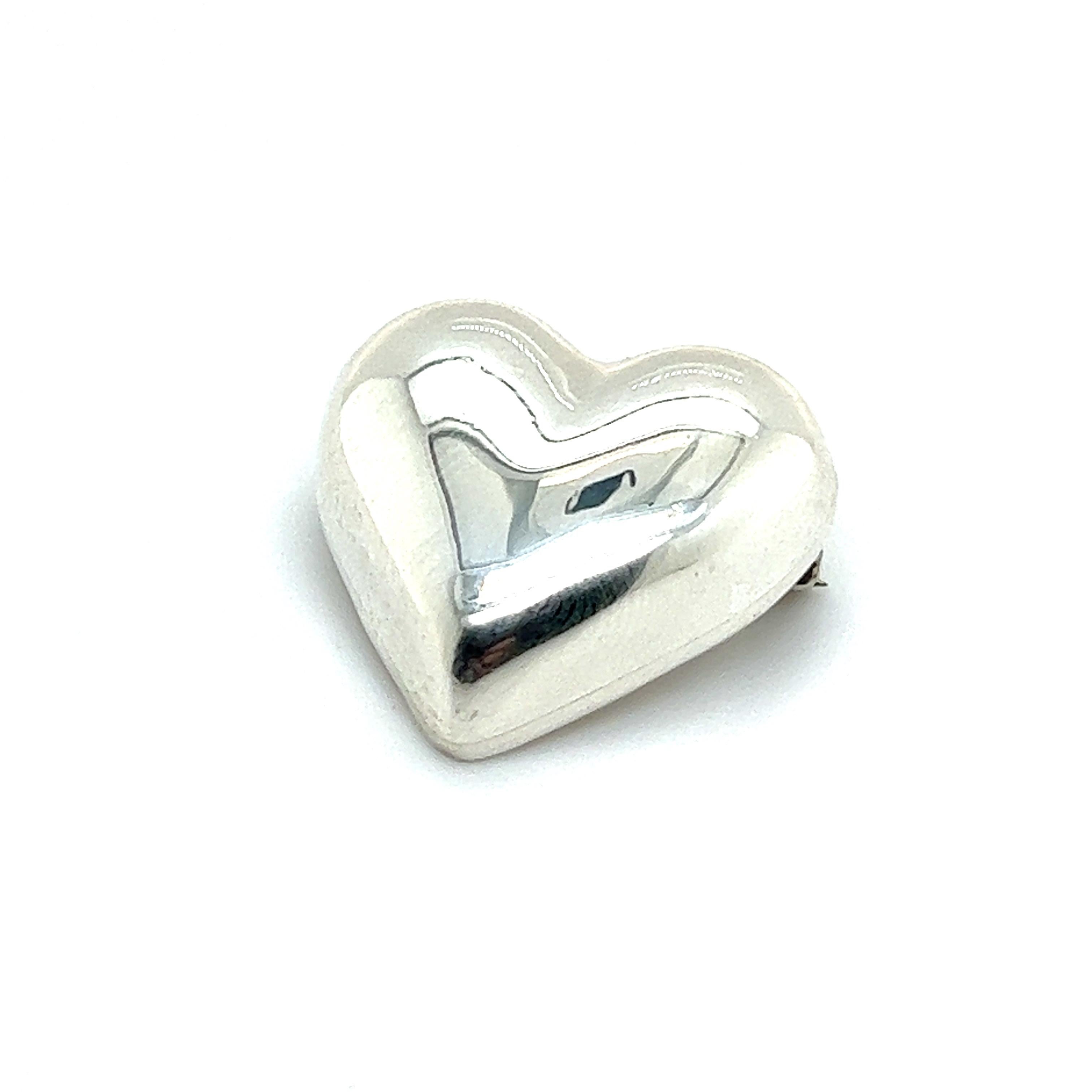 Authentic Tiffany & Co Estate Puffed Brooch Pin Sterling Silver TIF478

TRUSTED SELLER SINCE 2002

PLEASE SEE OUR HUNDREDS OF POSITIVE FEEDBACKS FROM OUR CLIENTS!!

FREE SHIPPING
Grams: 10.50
Shape: Puffed Heart
Material: Sterling Silver

We try to