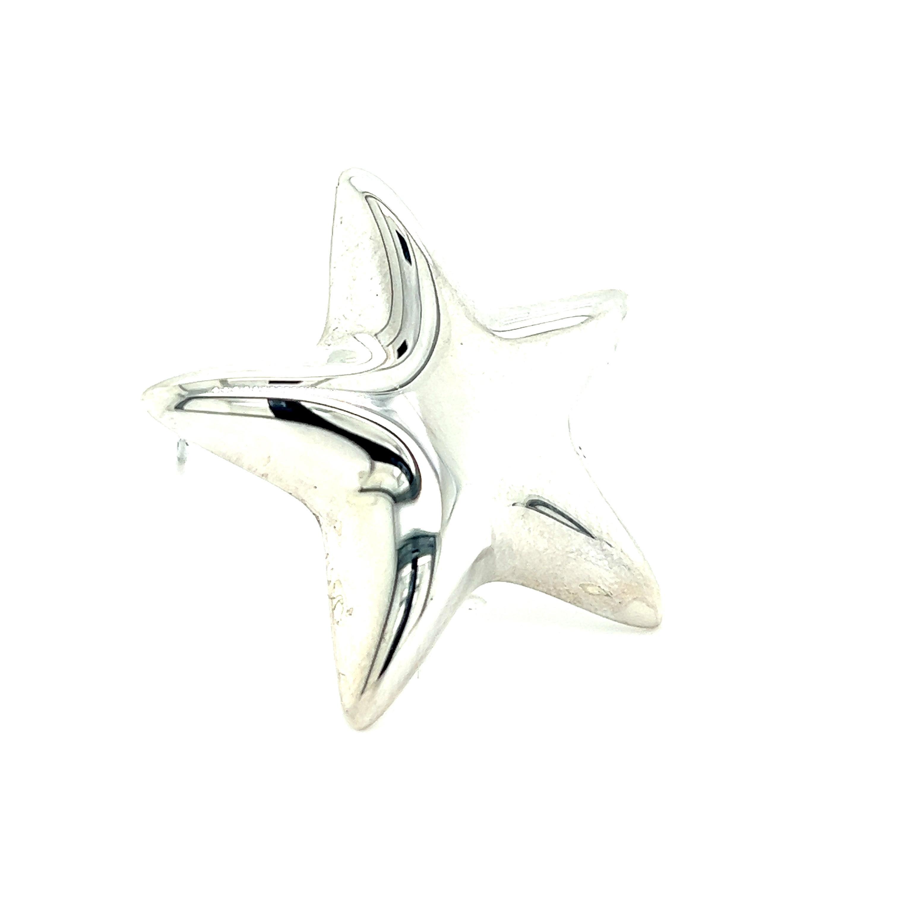 Authentic Tiffany & Co Estate Puffed Star Brooch Silver TIF740

TRUSTED SELLER SINCE 2002

PLEASE SEE OUR HUNDREDS OF POSITIVE FEEDBACKS FROM OUR CLIENTS!!

FREE SHIPPING
Weight: 10.2 Grams
Shape: Puffed Star Brooch
Material: Sterling Silver

