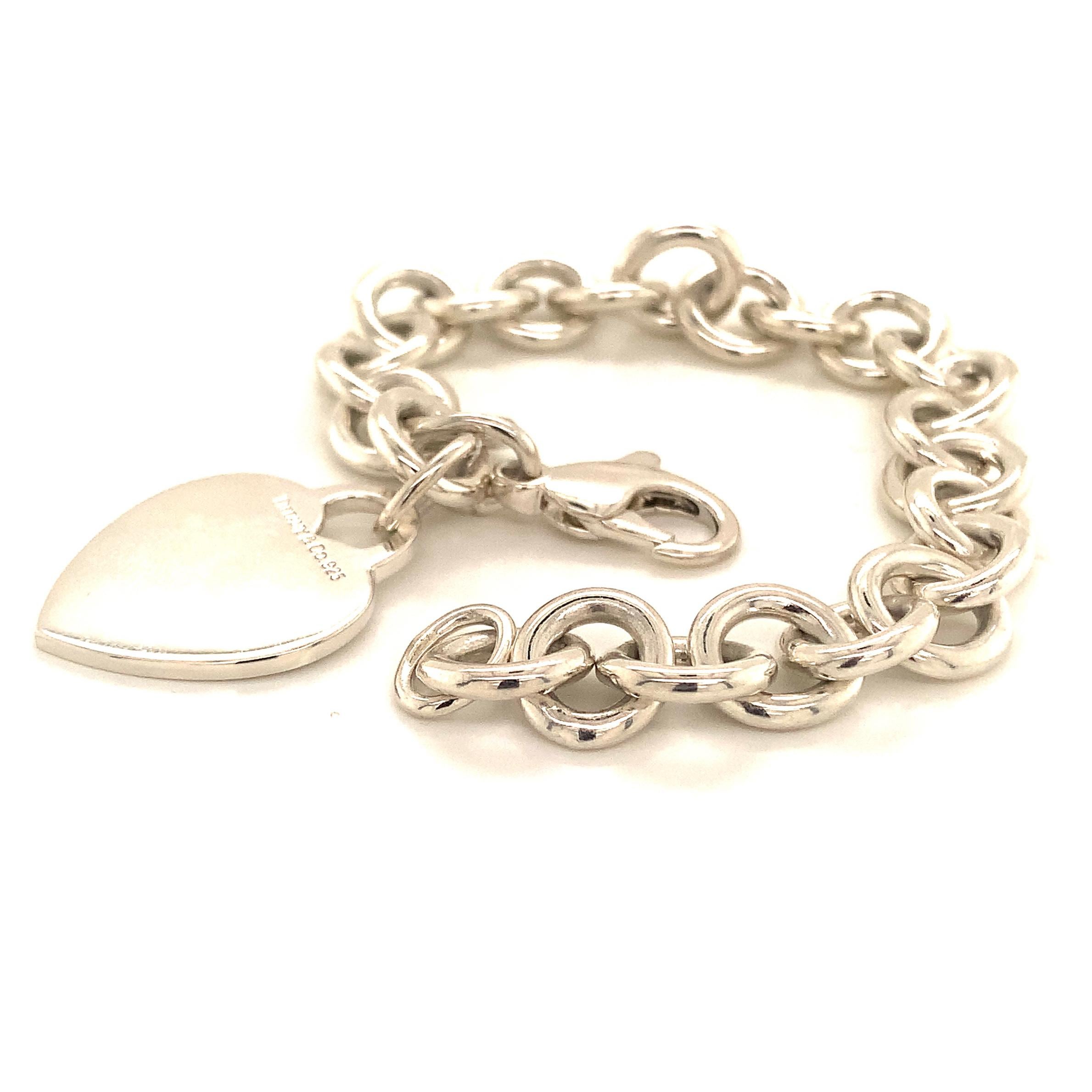 Tiffany & Co Sterling Silver Bracelet 7 Inches 34.2 Grams TIF102
 
This elegant Authentic Tiffany & Co bracelet is made of sterling silver and has a weight of 34.2 grams.

TRUSTED SELLER SINCE 2002
 
PLEASE SEE OUR HUNDREDS OF POSITIVE FEEDBACKS