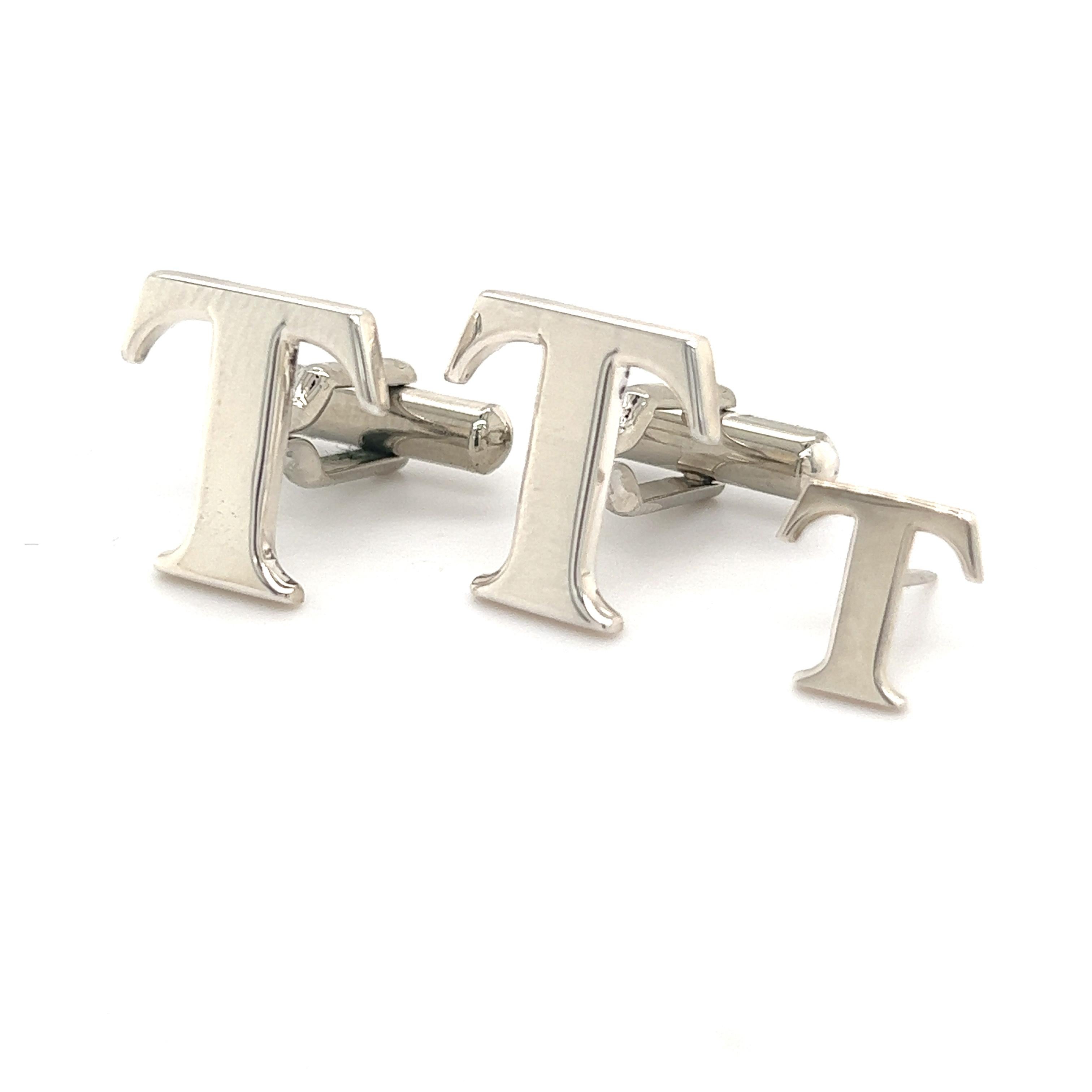 Tiffany & Co Estate T Cufflinks + Tie Pin Set Sterling Silver TIF264

TRUSTED SELLER SINCE 2002

PLEASE SEE OUR HUNDREDS OF POSITIVE FEEDBACKS FROM OUR CLIENTS!!

FREE SHIPPING

DETAILS
Metal: Sterling Silver
Weight: 7.55 Grams

These Authentic