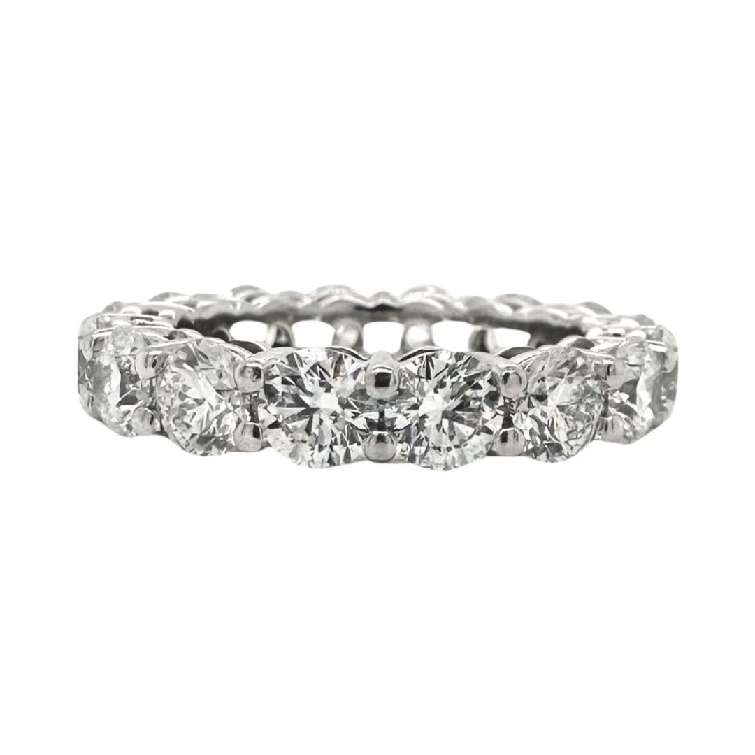 BRAND: Tiffany & Co.

MODEL: Eternity band

STONES: 16 White Diamonds

TOTAL CARAT WEIGHT: Approx 3.95ct

COLOR: E

CLARITY: Ranging from VVS1 to VS2

SIZE: 5

PACKAGING: Tiffany & Co. original box and certificates for all 16 stones.