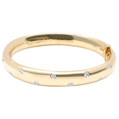 Tiffany 
Co. Etiole Diamond Bangle in 18 Karat Yellow Gold/Platinum 0.43 Carat