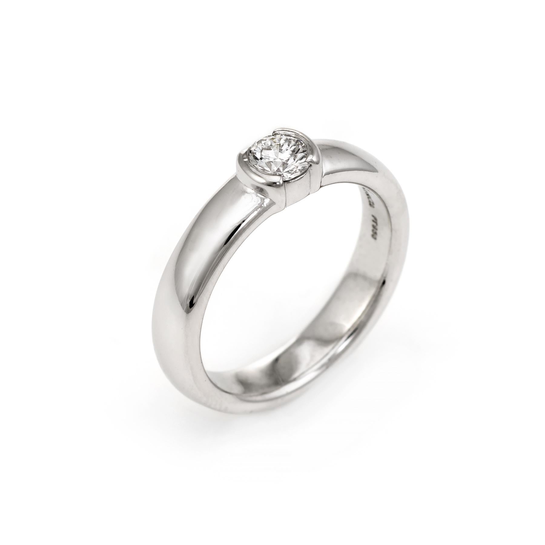 Elegant & finely detailed pre owned Tiffany & Co etoile engagement ring, crafted in 950 platinum. 

Centrally mounted round brilliant cut diamond measures 4.49 - 4.54 x 2.74mm. The diamond is 0.33 carats, graded E color and VVS1 clarity.  

Also