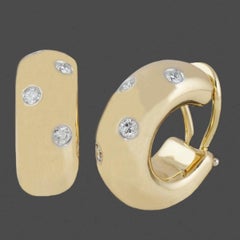 TIFFANY & Co. Pendientes de aro con clip «Etoile», de oro de 18 quilates y diamantes de 0,35 quilates