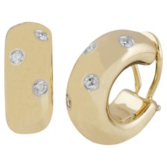 TIFFANY & Co. Pendientes de aro con clip «Etoile», de oro de 18 quilates y diamantes de 0,35 quilates
