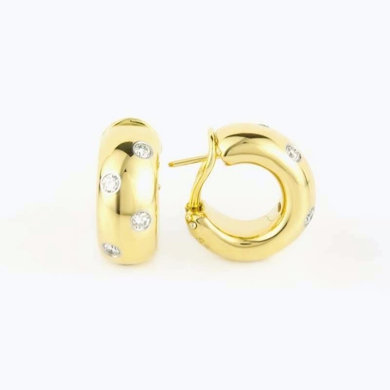 TIFFANY & Co. Etoile 18K Gold .35ct Diamond Hoop Earrings

Metal: 18K Yellow Gold
Weight: 15.0 grams 
Measurements: 19.25mm (0.76