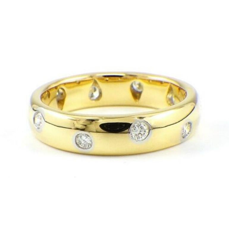 TIFFANY & Co. Etoile 18K Gold Diamond 4mm Band Ring 4.5 

Metal: 18K Gold 
Size: 4.5 
Band Width: 4mm
Diamond: 10 round brilliant cut diamonds, carat total weight .22
Hallmark: TIFFANY&CO. 750 PT950 
Condition: Excellent condition, like