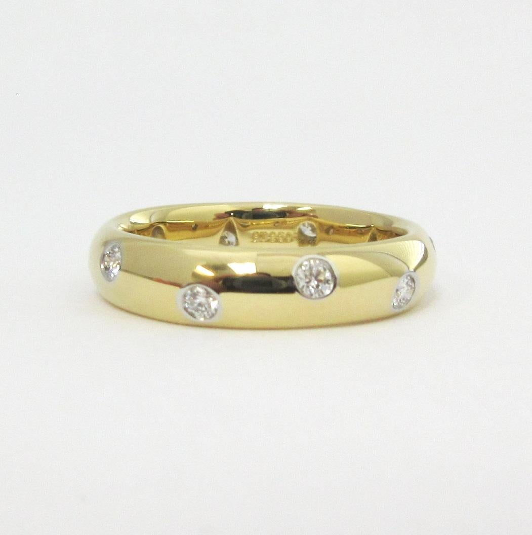 TIFFANY & Co. Etoile 18K Gold Diamond 4mm Band Ring 5

Metal: 18K Gold
Size: 5 
Band Width: 4mm
Diamond: 10 round brilliant diamonds, carat total weight .22
Hallmark: TIFFANY&CO. 750 PT950 
Condition: Excellent condition, like new, comes with the