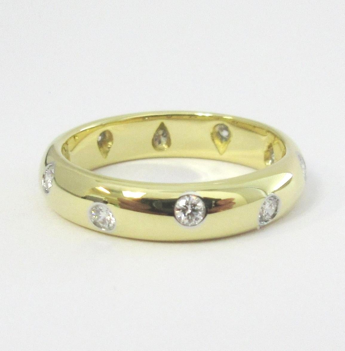 TIFFANY & Co. Etoile 18K Gold Diamond 4mm Band Ring 5

Metal: 18K Gold
Size: 5 
Band Width: 4mm
Diamond: 10 round brilliant diamonds, carat total weight .22
Hallmark: TIFFANY&CO. 750 PT950 
Condition: Excellent condition, like new, comes with the