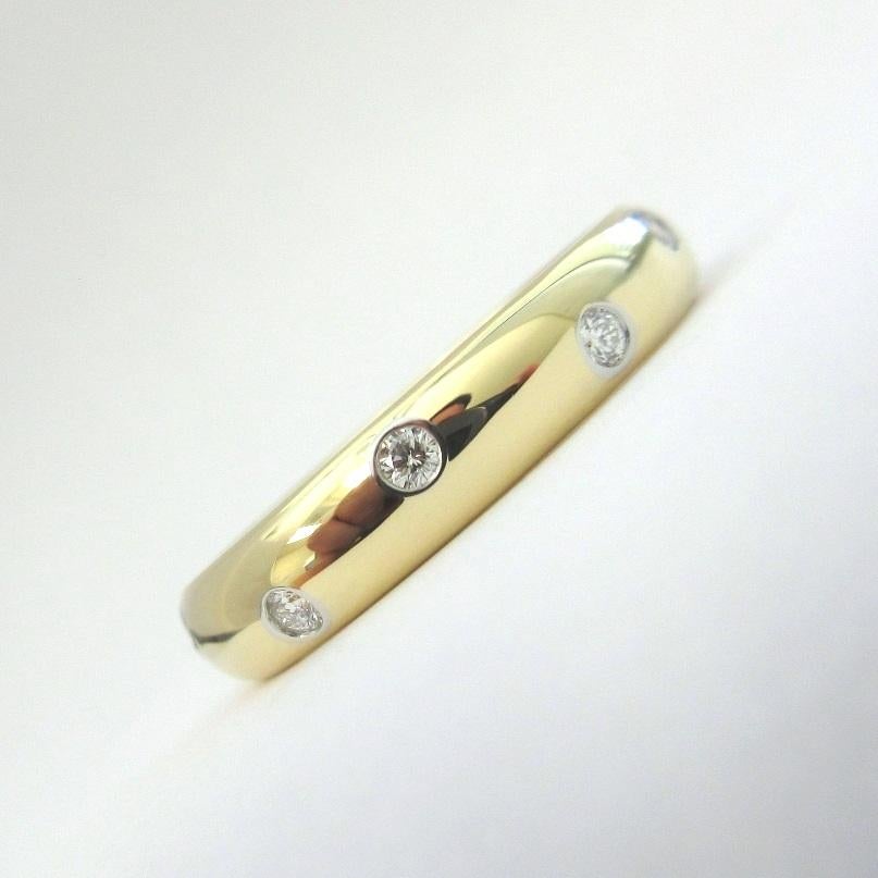 TIFFANY & Co. Etoile 18K Gold Diamond 4mm Band Ring 8.5 

Metal: 18K gold 
Size: 8.5 
Band Width: 4mm
Diamond: 10 round brilliant diamonds, carat total weight .22
Hallmark: T&Co. 750 PT950 
Condition: Excellent condition, like new, comes with