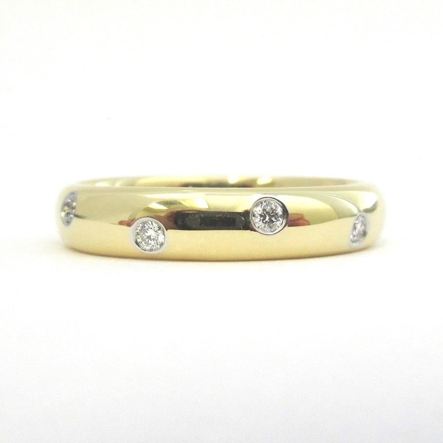 TIFFANY & Co. Anello Etoile in oro 18 carati con diamante 4 mm 8,5

Metallo: oro 18 carati
Dimensione: 8.5 
Larghezza della banda: 4 mm
Diamante: 10 diamanti tondi taglio brillante, peso totale .22 carati
Marchio di fabbrica: AT&T. 750 PT950
