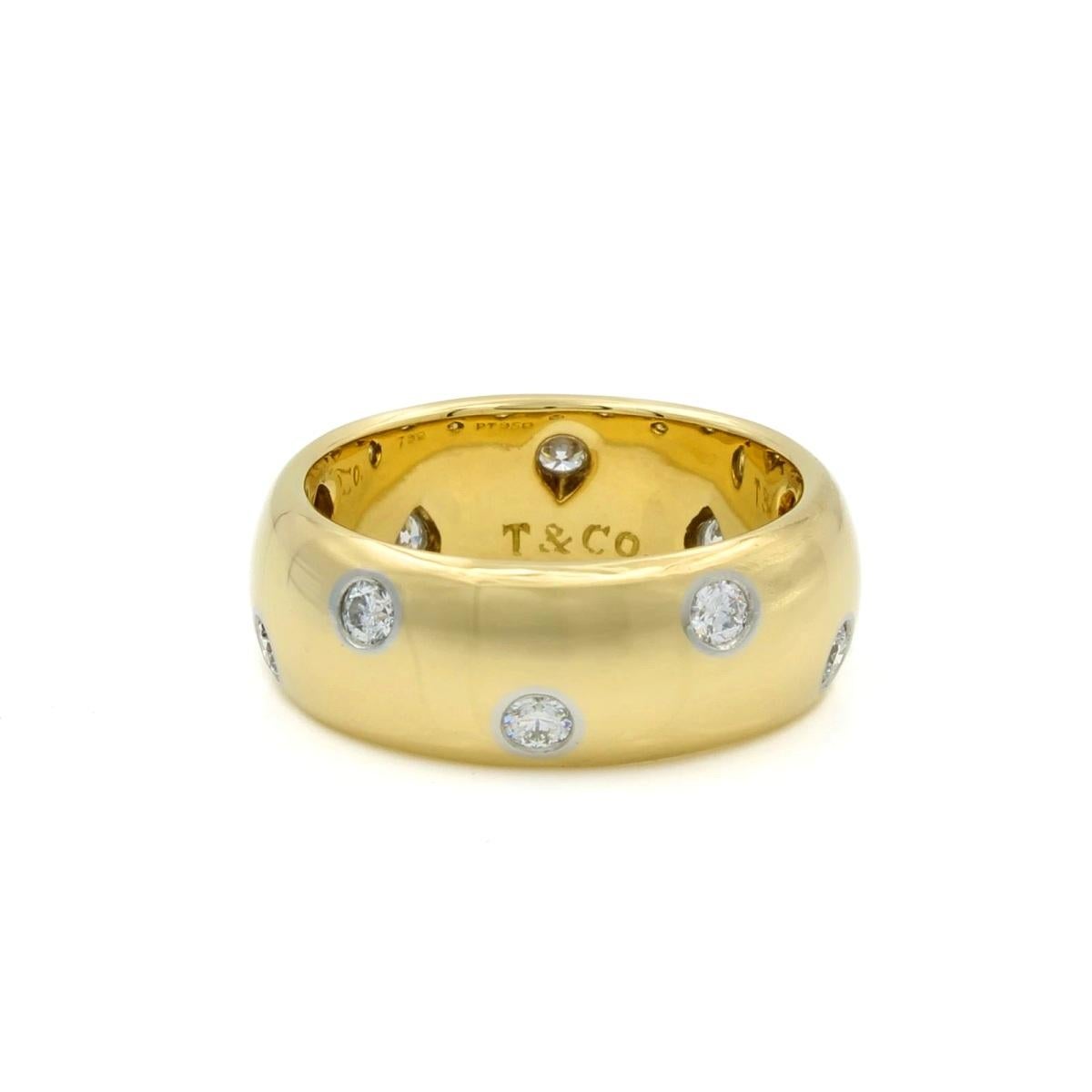 TIFFANY & Co. Anillo Etoile de oro de 18 quilates con diamantes de 8 mm 6,5

Metal: Oro de 18 quilates
Tamaño: 6,5 
Peso: 10.80 gramos
Ancho de banda: 8 mm
Diamante: 10 diamantes brillantes redondos, peso total en quilates 0,44
Sello: T&CO. 750