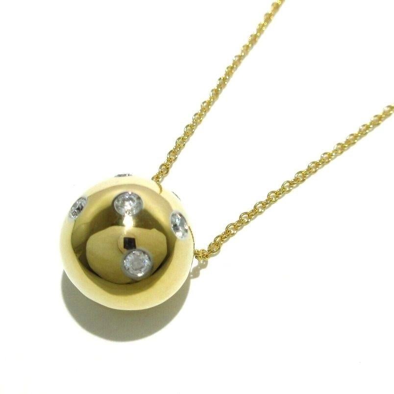 TIFFANY & Co. Etoile 18K Gold Diamond Ball Pendant Necklace

Metal: 18K yellow gold
Weight: 5.30 grams
Chain: 16
