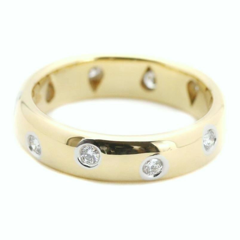 TIFFANY & Co. Etoile 18K Gold Diamond 4mm Band Ring 5.5 

Metal: 18K gold 
Size: 5.5 
Band Width: 4mm
Diamond: 10 round brilliant diamonds, carat total weight .22
Hallmark: TIFFANY&Co. 750 PT950 
Condition: Excellent condition, like new, comes with