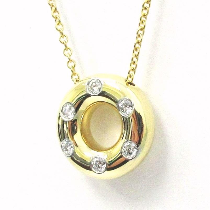 TIFFANY & Co. Etoile 18K Gold Diamond Circle Pendant Necklace In Excellent Condition For Sale In Los Angeles, CA