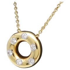 TIFFANY & Co. Etoile Collier pendentif cercle en or 18 carats et diamants