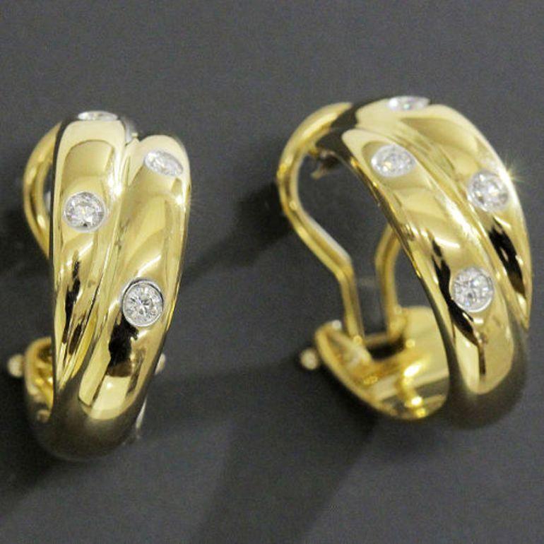TIFFANY & Co. Orecchini a cerchio con diamanti in oro 18 carati Etoile

Metallo: Oro giallo 18 carati
Peso: 11.50 grammi 
Misure: Diametro del cerchio 19 mm (0,75