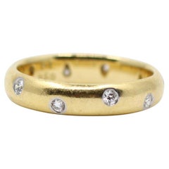 Anello a fascia con diamante in oro 18 carati e platino Tiffany & Co.