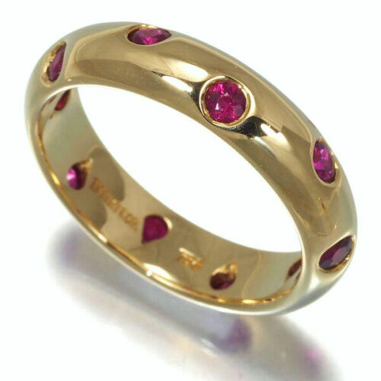  TIFFANY & Co. Etoile 18K Gold Ruby Band Ring 5

Metal: 18K Yellow Gold 
Size: 5
Band Width: 4mm
Weight: 4.30 grams
Ruby: 10 round rubies, carat total weight .25 
Hallmark: TIFFANY&CO. 750 
Condition: Like new, comes with Tiffany pouch and