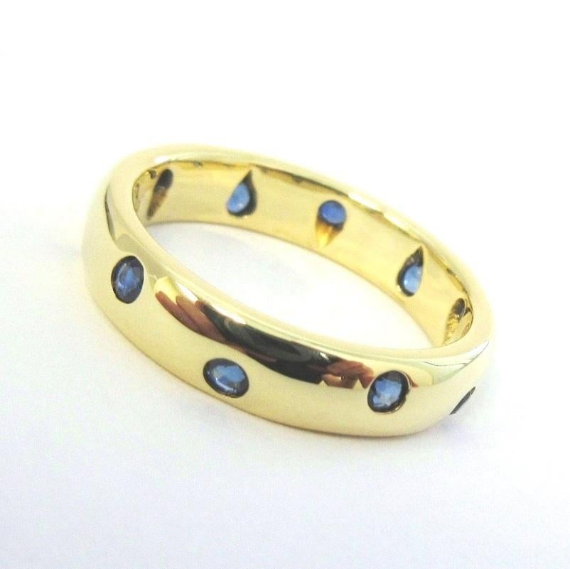 TIFFANY & Co. Etoile 18K Gold Sapphire Band Ring 5.5 

Metal: 18K Yellow Gold 
Size: 5.5 
Band Width: 4mm
Sapphire: 10 round blue sapphires, carat total weight .25 
Hallmark: TIFFANY&CO. 750 
Condition: Excellent condition, like new

Limited