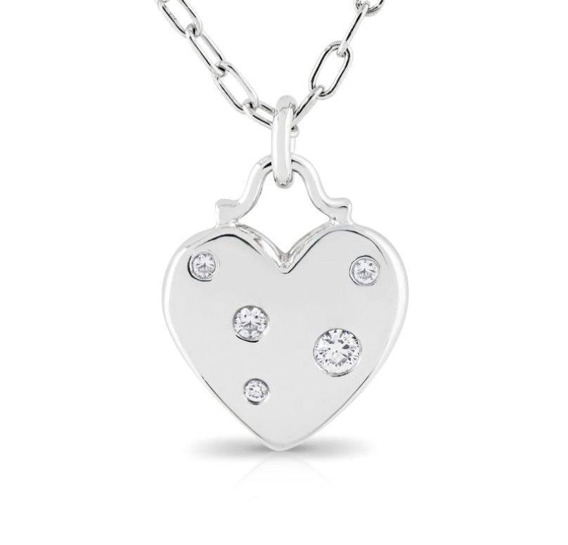 TIFFANY & Co. Etoile Collier pendentif coeur en or blanc 18K à 5 diamants

Métal : or blanc 18K
Poids : 6.30 grammes
Chaîne : 16