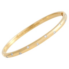 Tiffany & Co. Etoile 18K Yellow Gold and Platinum 0.22 Ct Diamond Bangle Bracele