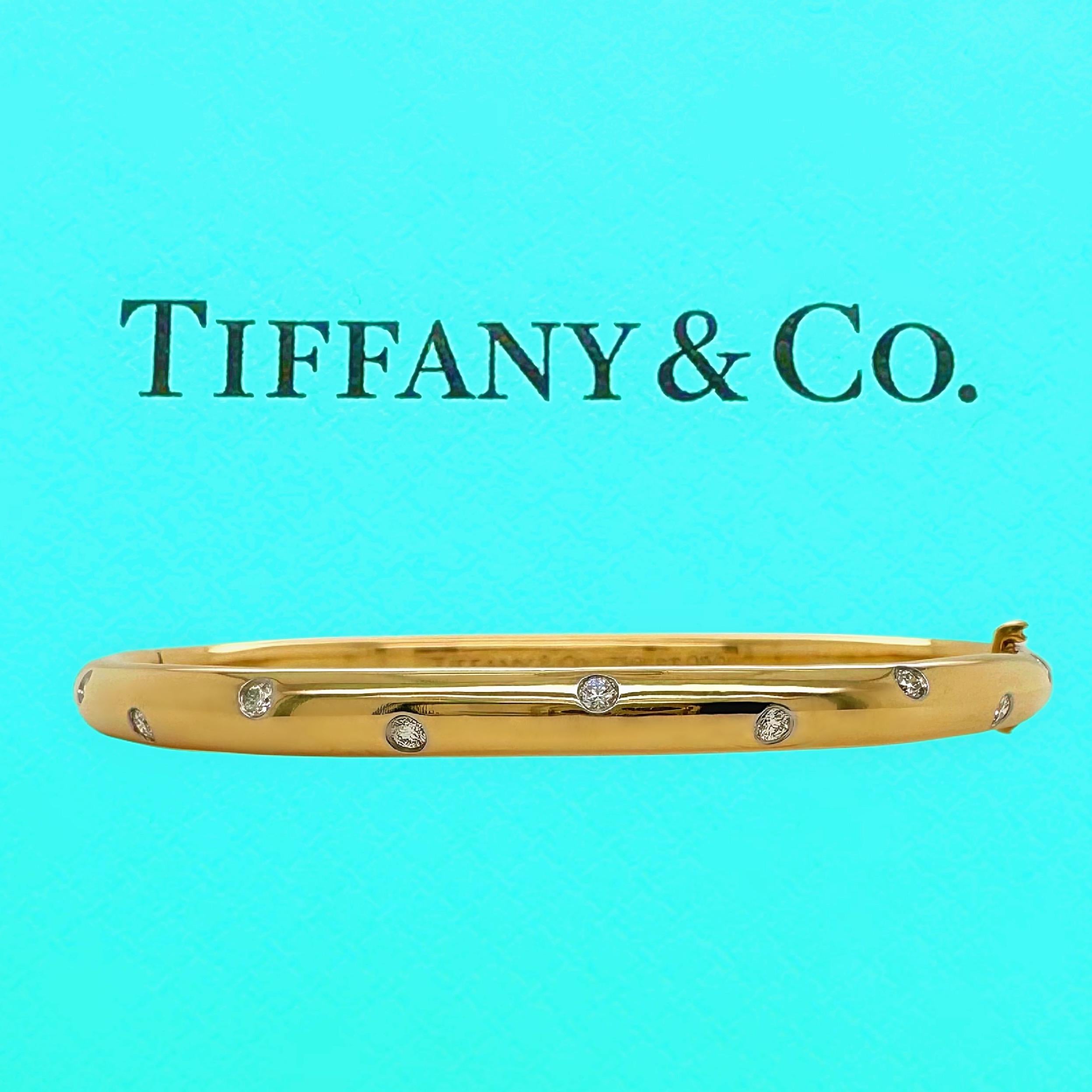 Tiffany & Co. ETOILE Diamond Bangle
Style:   Bangle Bracelet
Metal:   18K Yellow Gold. 36.7 grams
Size:  7.0 