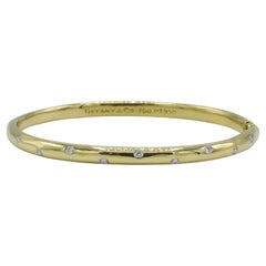 Tiffany & Co. Etoile Bracelet en or jaune 18K et platine avec diamants naturels