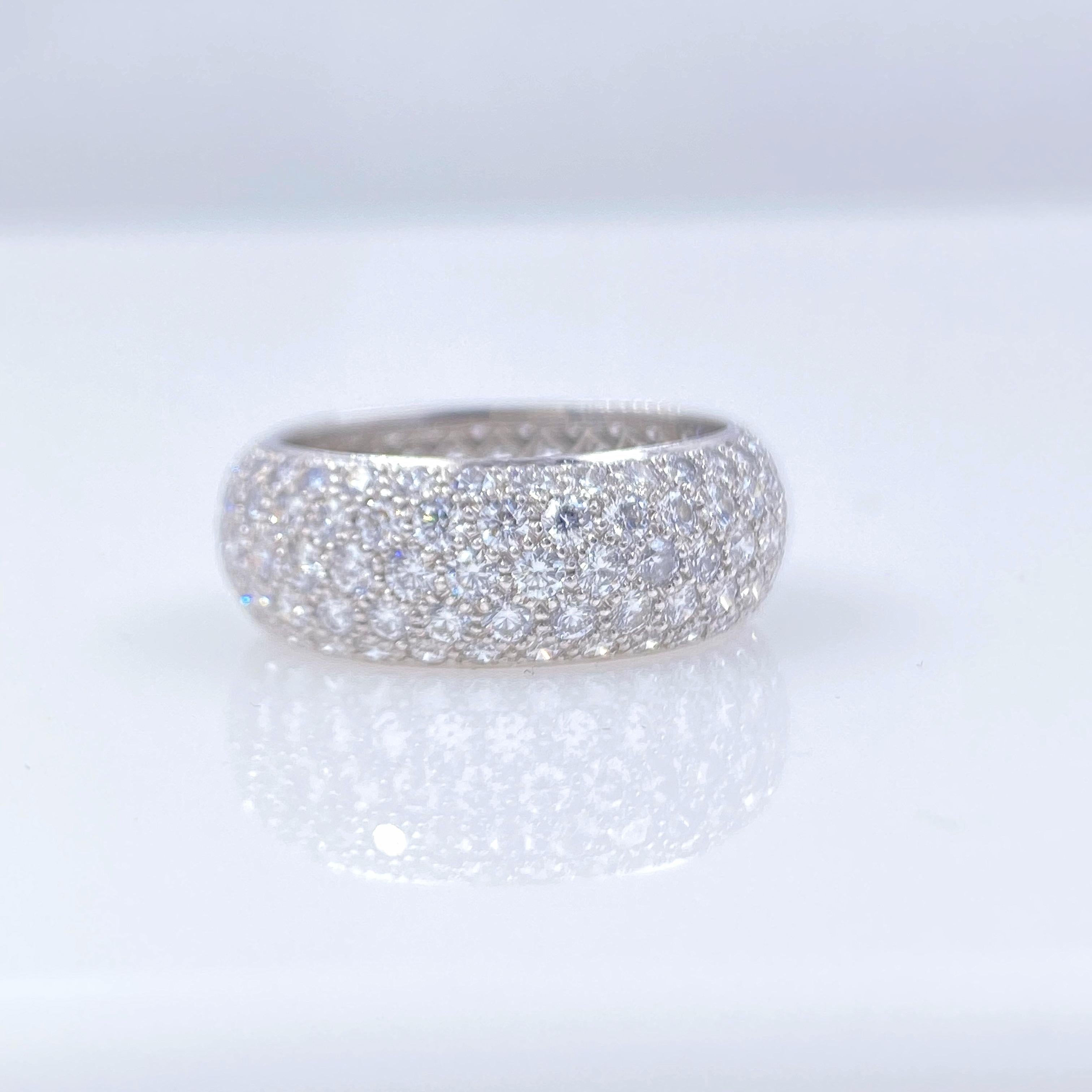 Tiffany & Co Etoile
Style:  Five-Row Diamond Full Circle Band Ring
Metal:  Platinum
Size:  8
Width:  10 MM
TCW:  3.75 tcw
Main Diamond:  Round Brilliant Cut Diamonds
Color & Clarity:  F - G / VVS2 - VS1
Hallmark:  PT950 ©TIFFANY&CO.
Includes:  T&C