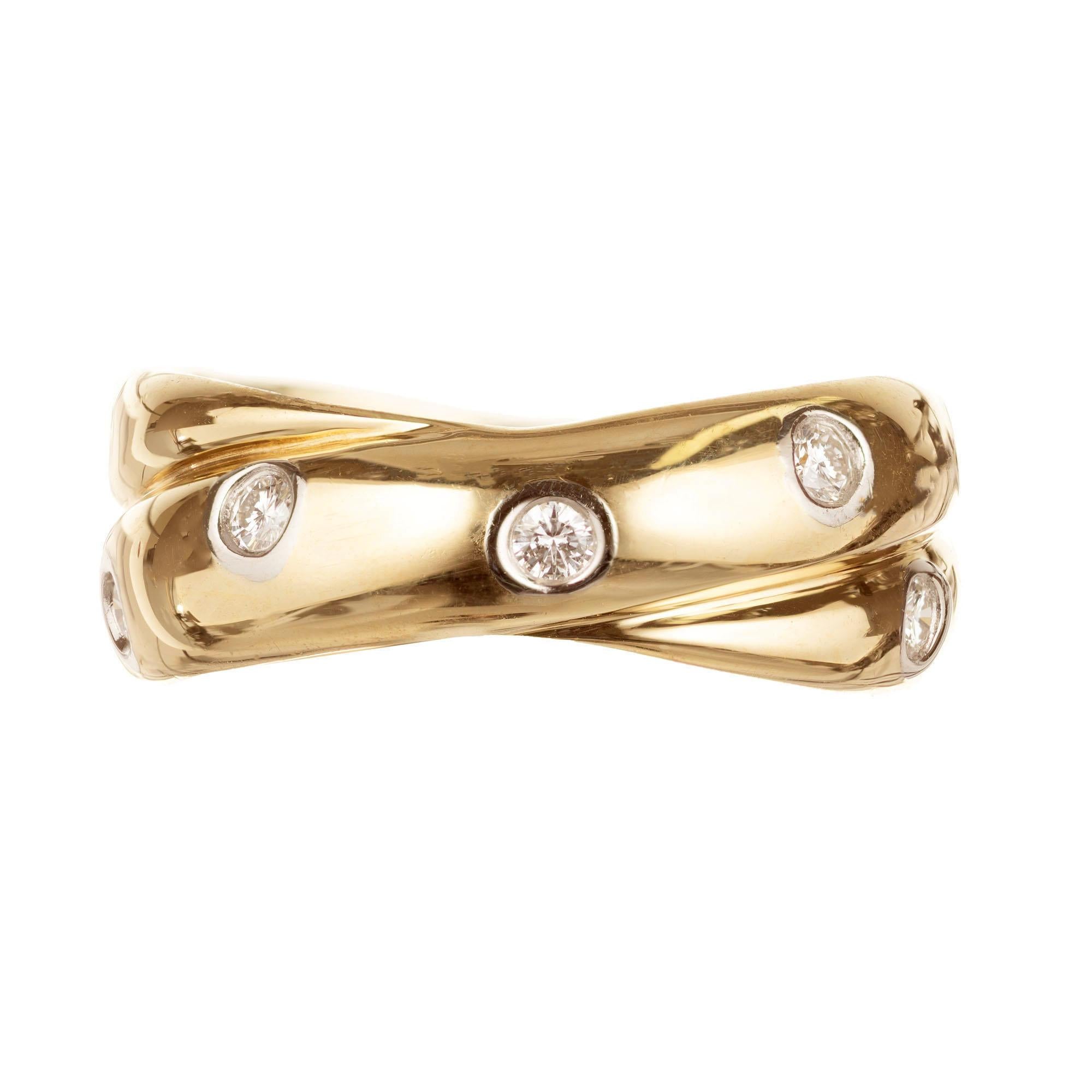 Authentic Tiffany & Co Etoile criss cross 18k ring with round diamonds in Platinum bezels set in 18k yellow gold setting. 

12 full cut diamonds, approx. total weight .31cts, F-G, VS
Size 5 3/4 and not sizable
18k Yellow Gold
Platinum
6.7