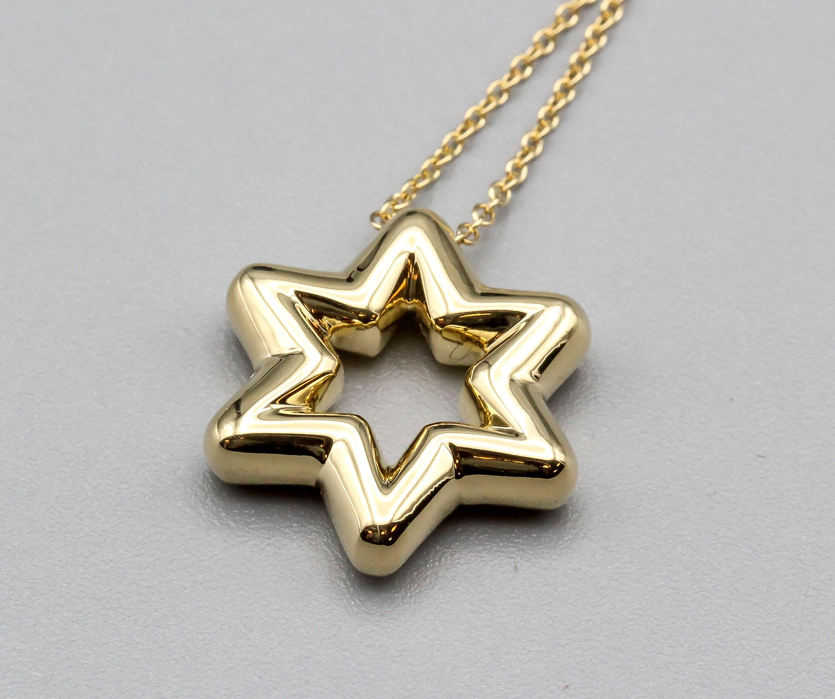 Fine diamond and 18K yellow gold David's Star necklace from the 