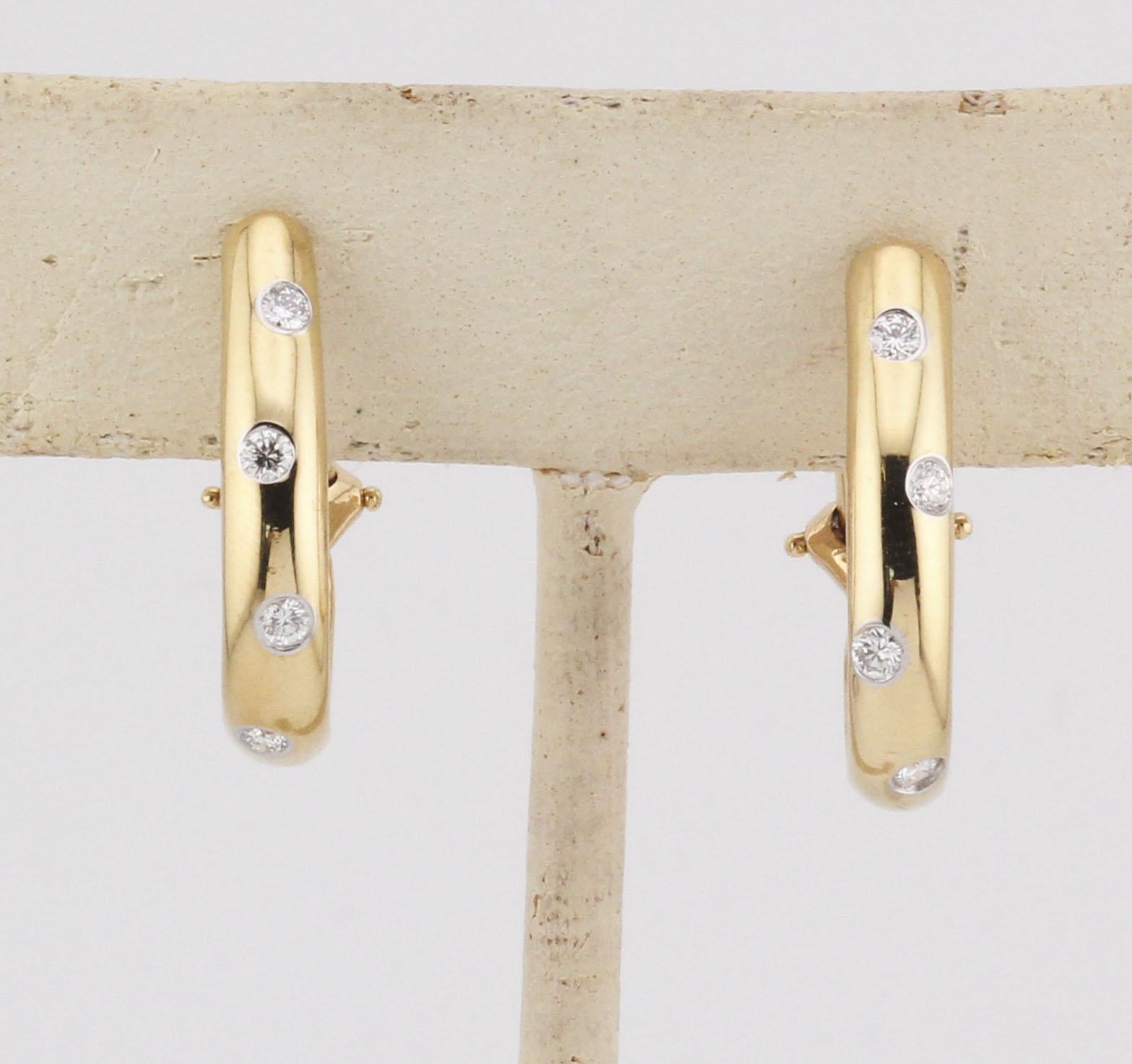 A timeless blend of elegance and everyday luxury, the Tiffany 
Co. Etoile Hoop Earrings embody the refined sophistication that defines the house’s celebrated design legacy. Crafted in radiant 18k yellow gold and accented with platinum bezels,