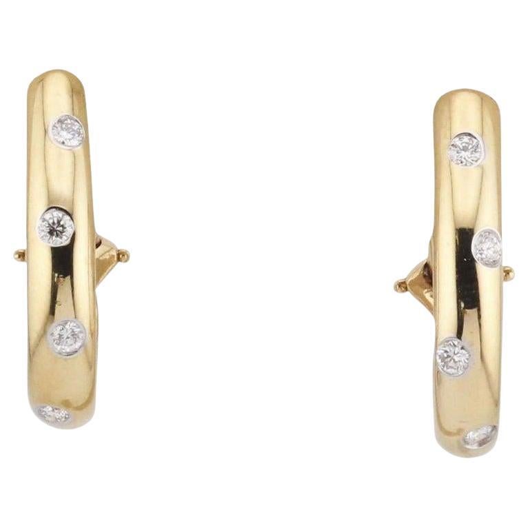 Tiffany 
Co. Etoile Diamond 18k Gold Platinum Hoop Earrings