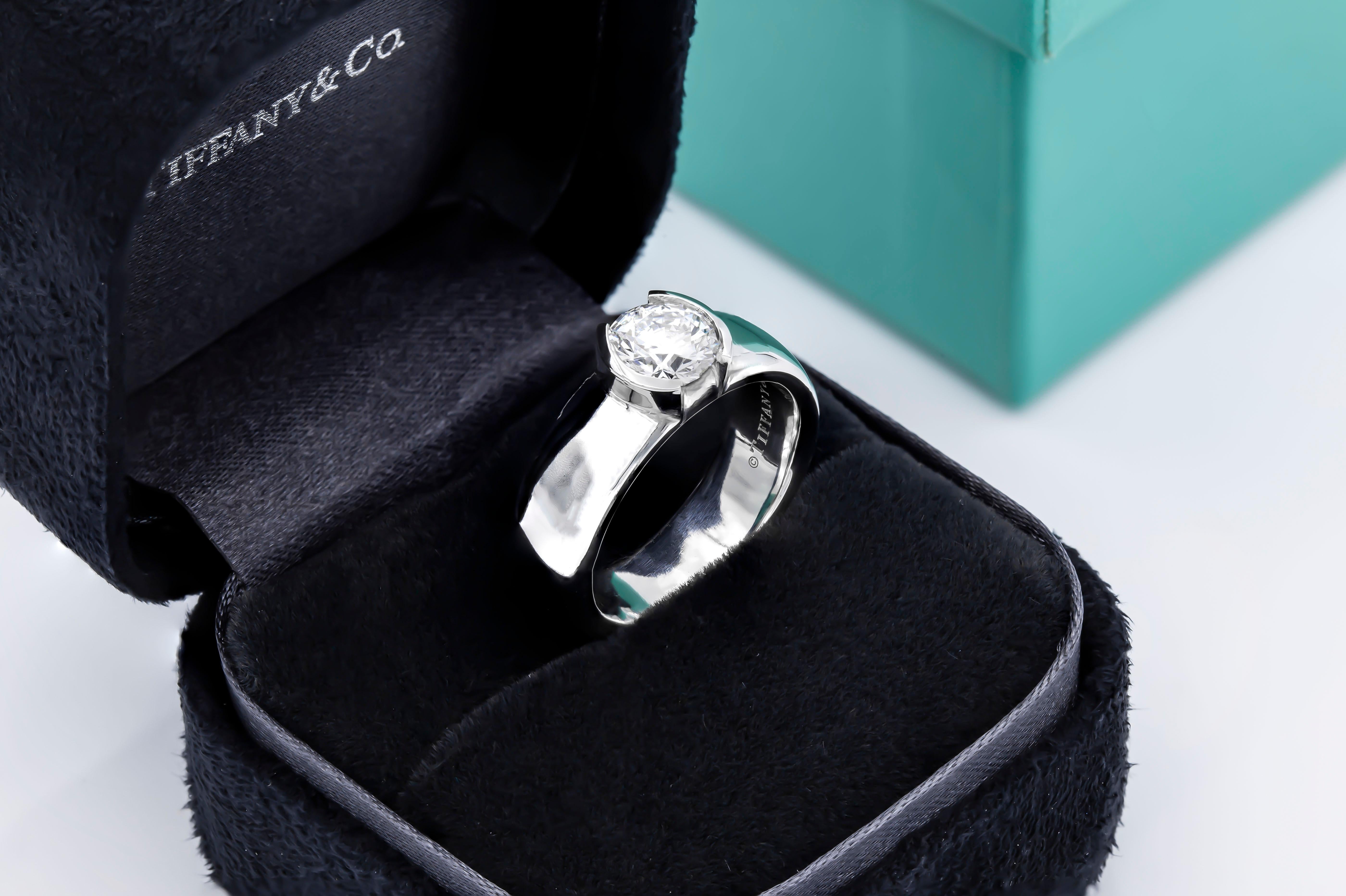 Tiffany & Co. Etoile Engagement ring in Platinum 950
Beautiful and timeless design!
With original Tiffany blue book
Center stone: 1.27ct E VVS1 Round Diam 
Measurements 7.03- 7.10 x 4.26 mm
Carat Weight: 1.27 carat
Color Grade E
Clarity Grade