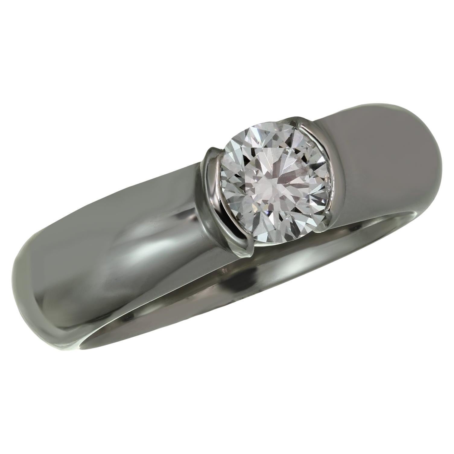 Tiffany & Co. Etoile Bague de fiançailles en platine avec diamant 0,54 TCW E VVS2, boîte et papiers d'origine en vente