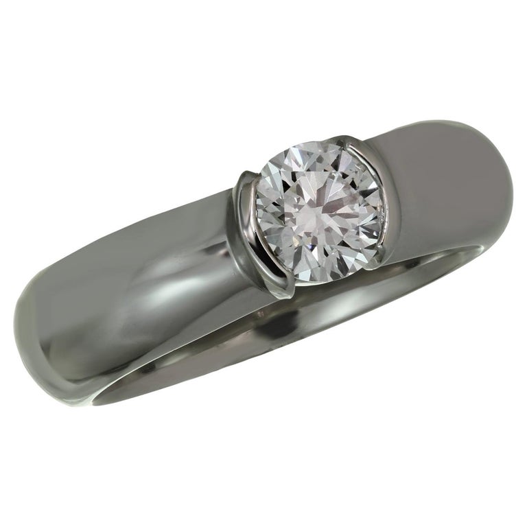 Tiffany and Co. Etoile Bague de fiançailles en platine avec diamant 0,54  TCW E VVS2, boîte et papiers d'origine En vente sur 1stDibs