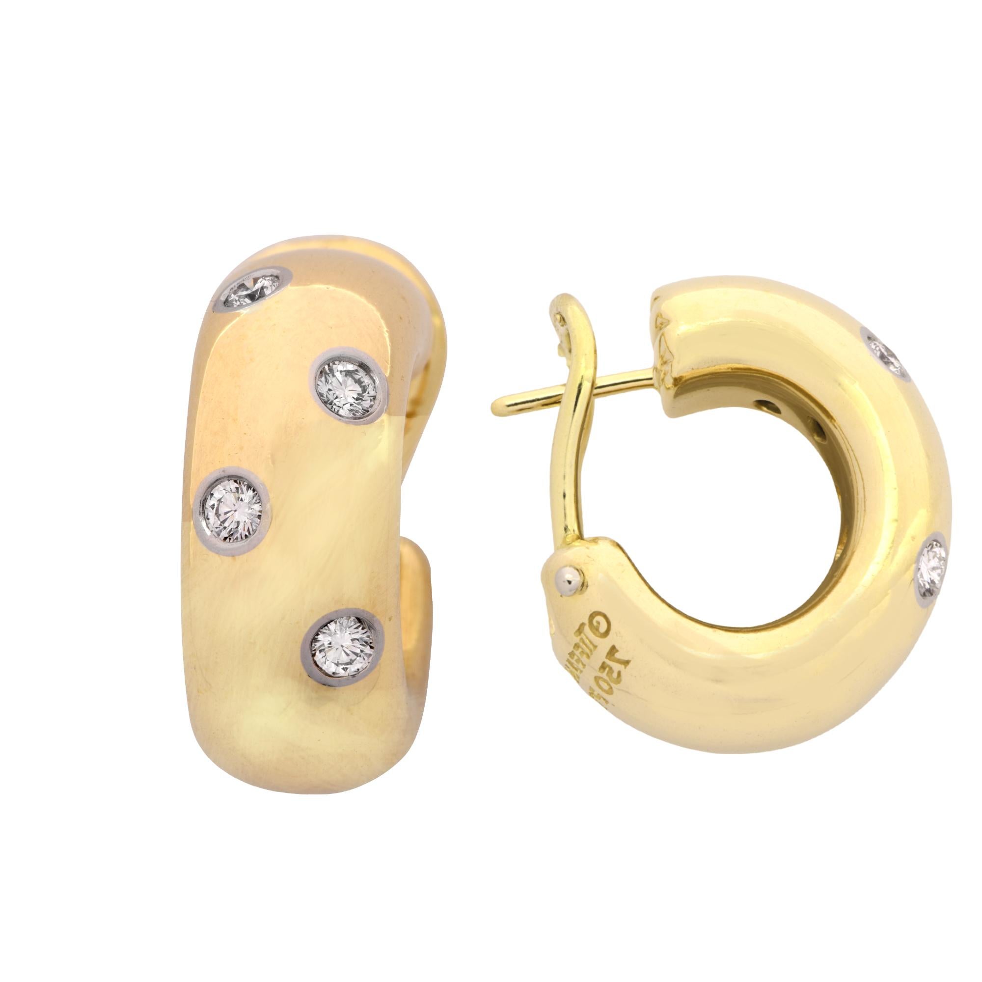 From the Tiffany & Co. Etoile Collection, these timeless huggies earrings, crafted in 18 Karat Yellow Gold and Platinum, feature 8 round brilliant cut diamonds weighing approximately .35 carats, G color, VS clarity. These beautiful earrings measure