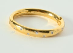 Tiffany & Co. Bracciale Bangle Etoile in oro con diamanti