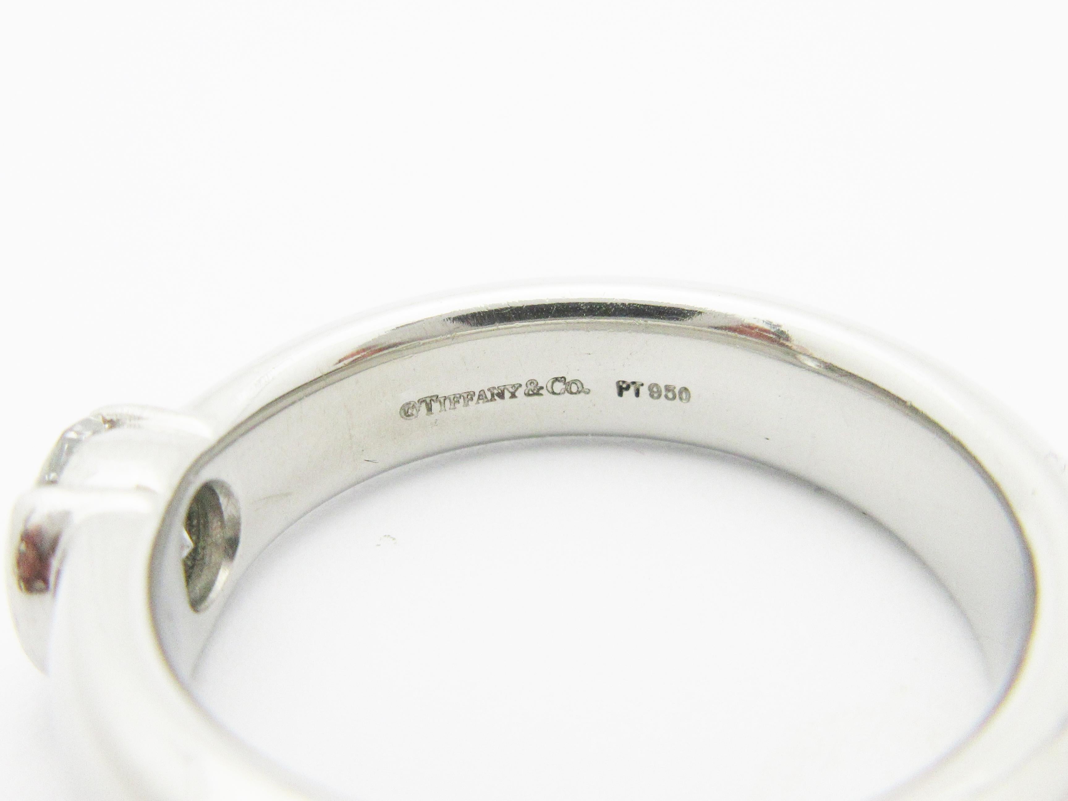 Modern Tiffany & Co. Etoile Half Bezel .70 Carat Diamond Engagement Ring Platinum