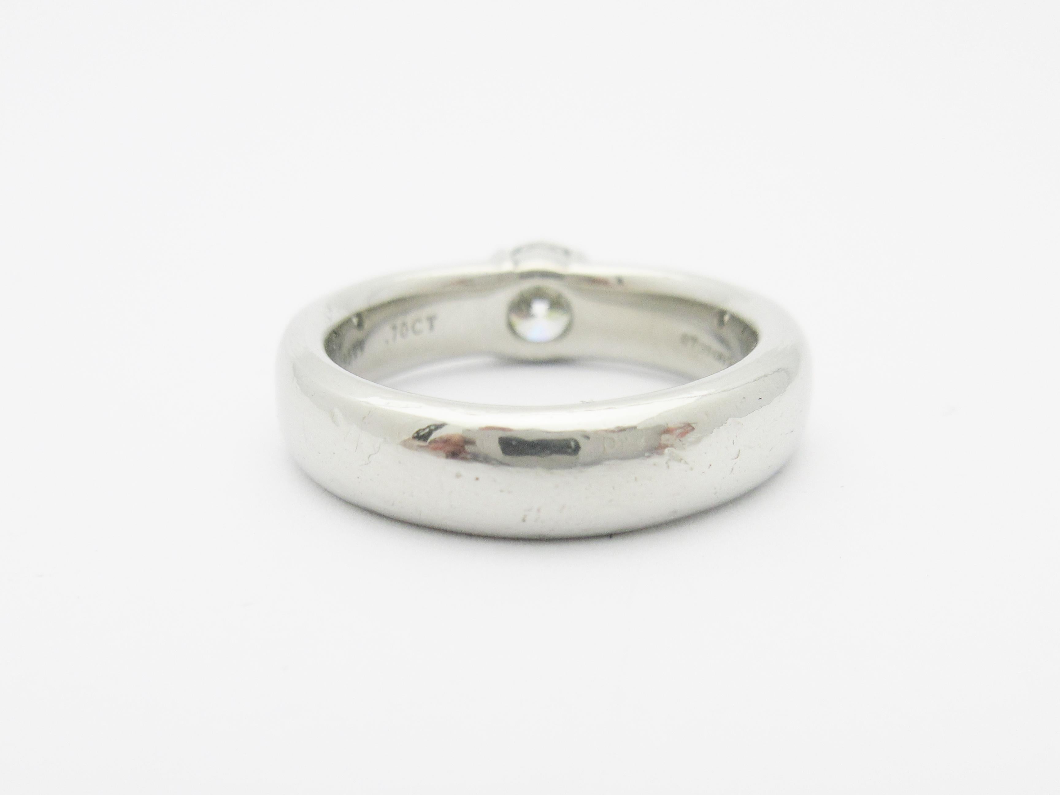 Round Cut Tiffany & Co. Etoile Half Bezel .70 Carat Diamond Engagement Ring Platinum