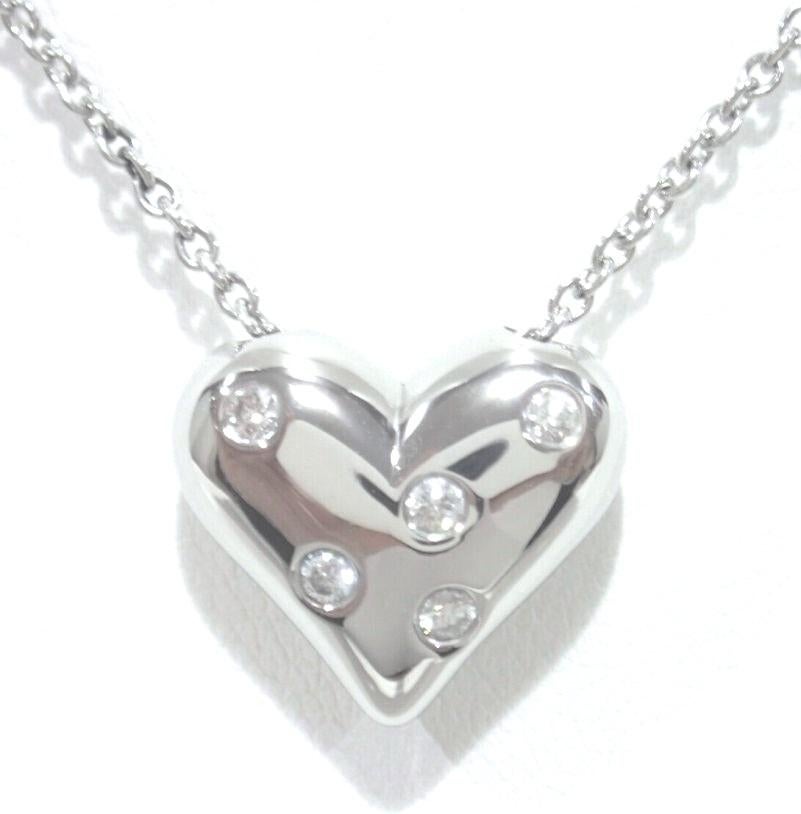 TIFFANY & Co. Etoile Platinum 5 Diamond Heart Pendant Necklace

Metal: Platinum
Weight: 12.0 grams
Chain: 16
