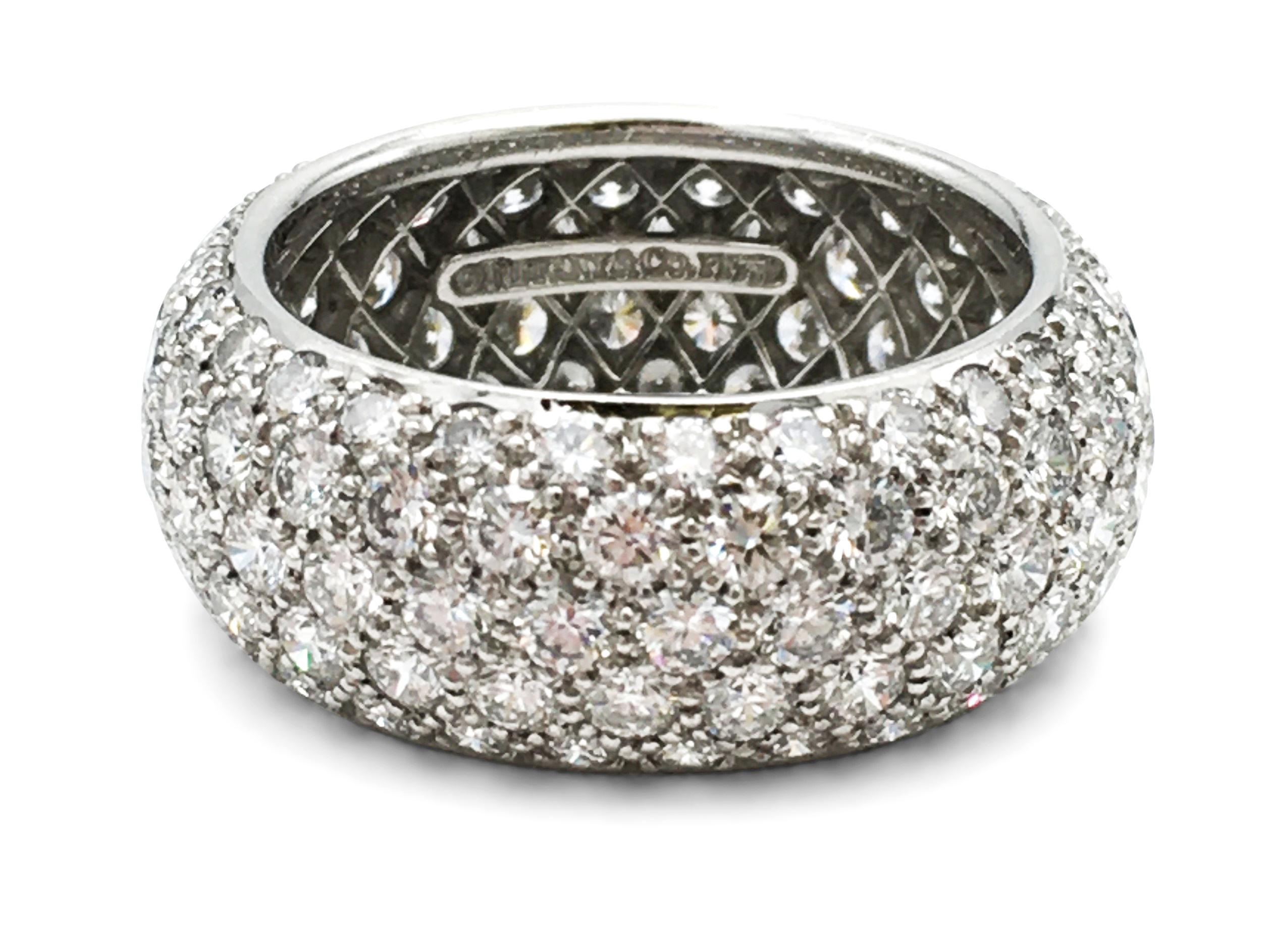 Authentic Tiffany & Co. 'Etoile' five-row band ring crafted in platinum and set with an estimated 3.30 carats of high-quality round brilliant cut diamonds. Ring size 5. Signed Tiffany & Co., PT950. The ring is not presented with original papers or