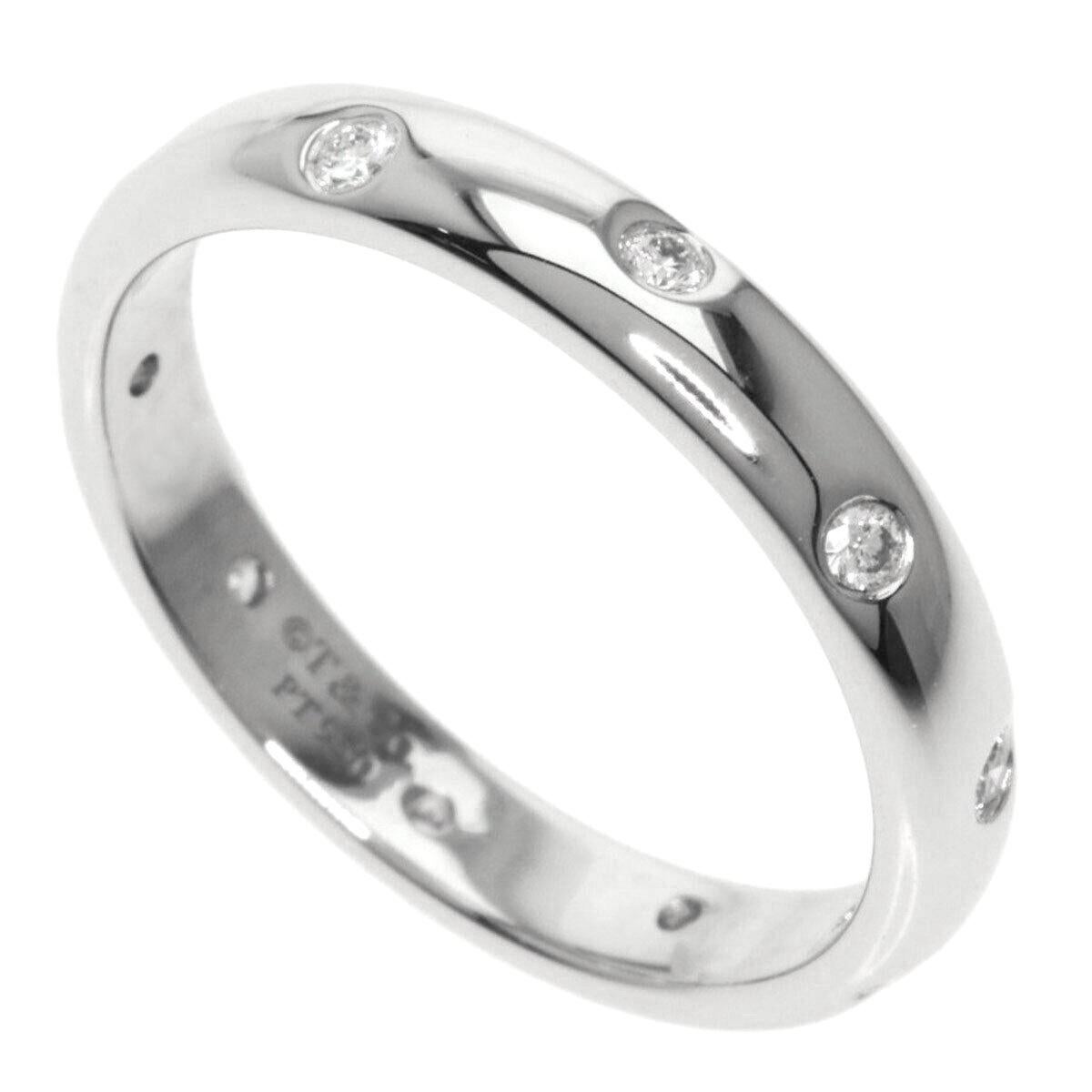 TIFFANY & Co. Etoile, bague à anneau de 3 mm en platine et diamants 4,5

 Métal : Platine
 Taille : 4.5 
 Largeur de la bande : 3 mm 
 Diamant : 10 diamants ronds de taille brillant, poids total de 0,10 carat.
 Hallmark : ©T&Co. PT950
 Condit :