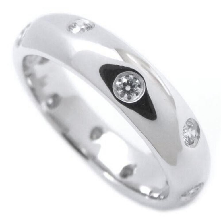 TIFFANY & Co. Etoile Platinum Diamond 4mm Band Ring 4

 Metal: Platinum
 Size: 4 
 Band Width: 4mm
 Weight: 6.70 grams 
 Diamond: 10 round brilliant diamonds, carat total weight .22
 Hallmark: T&Co. PT950
 Condition: Excellent condition, like new,